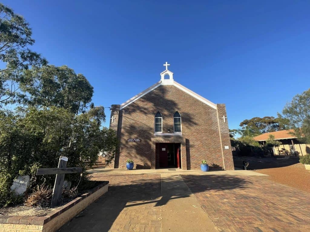 Bunbury Catholic Diocese church building with clear blue sky.