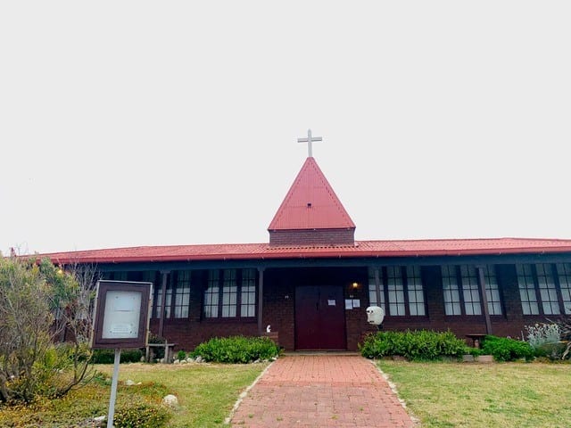 Bunbury Catholic Diocese church with red roof and cross in Bunbury, Australia.