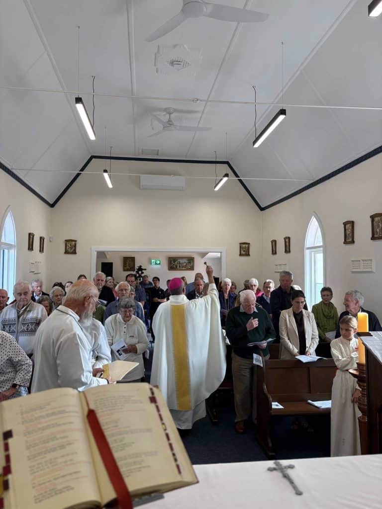 Congregation attending a church service at Bunbury Catholic Diocese.