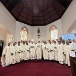 Group of priests and bishops inside Saint Joseph Church of Albany.