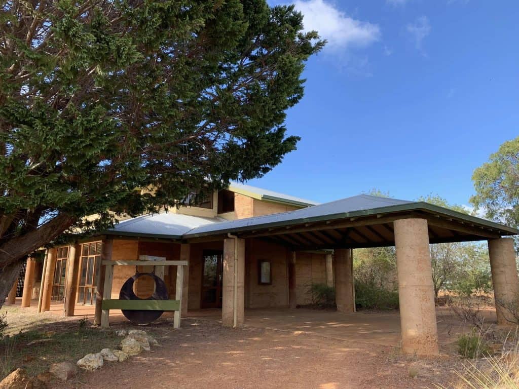Bunbury Catholic Diocese parish building with a covered entrance and surrounding trees.